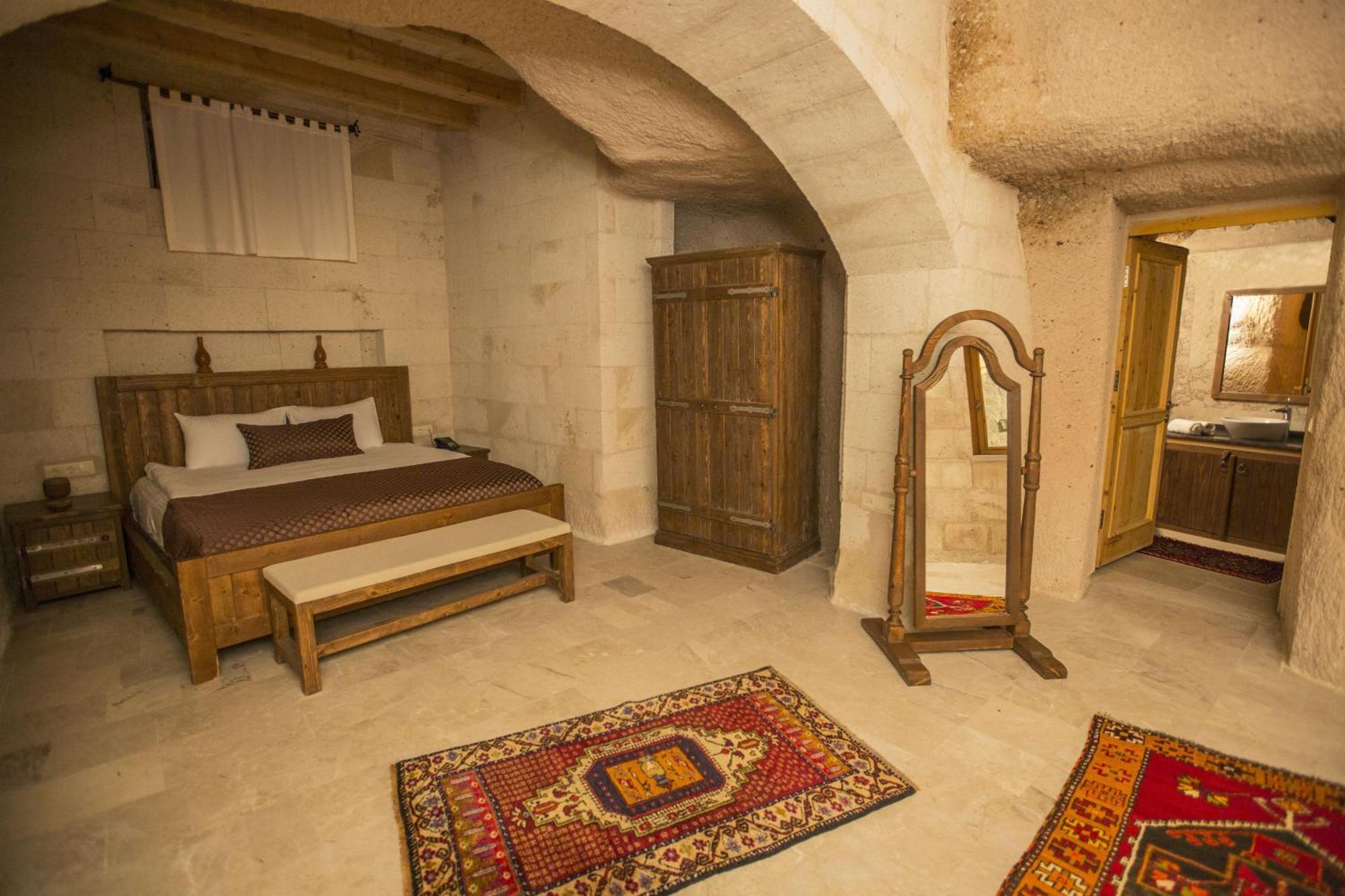 Helike Cave Suites Uchisar Zimmer foto